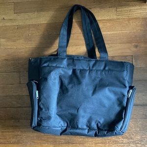 Black pump tote bag with shoulder strap